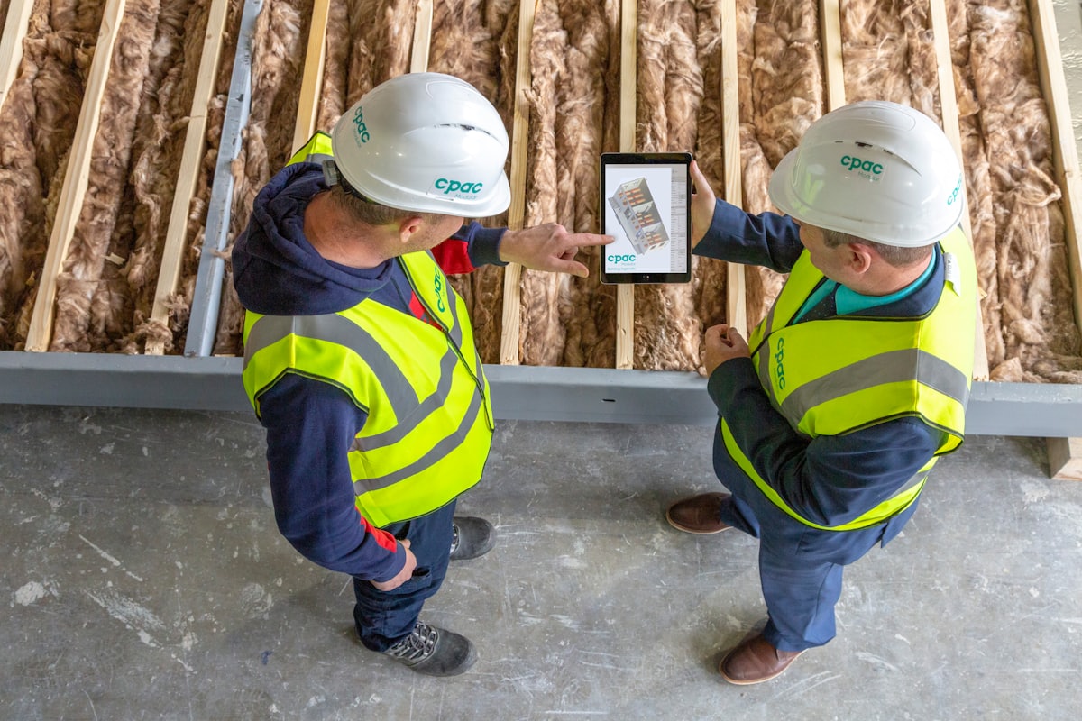 B2 Energy engineers reviewing project plans on site